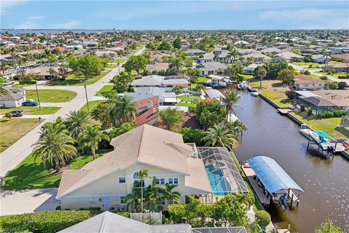Aerial view of residential area with a large body of water