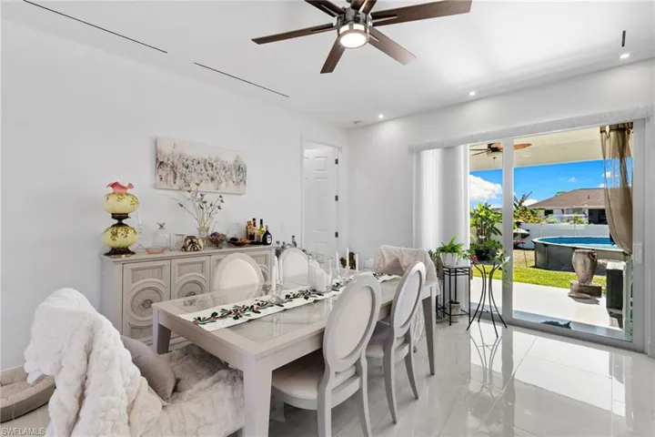 Dining room with marble tiled floors