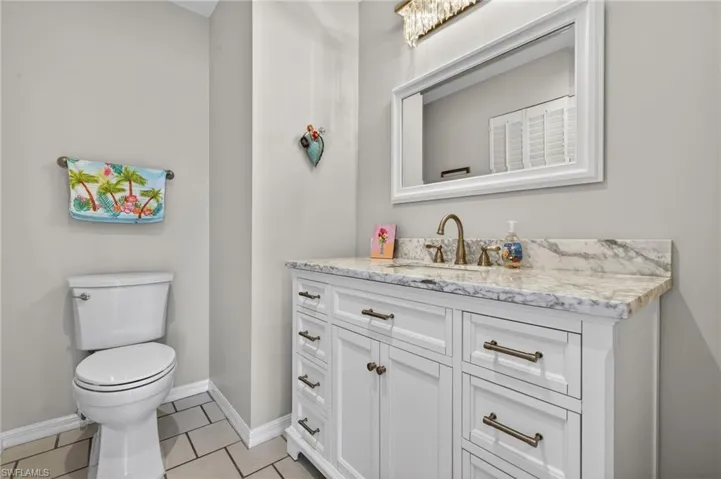Bathroom featuring vanity and light tile patterned floors