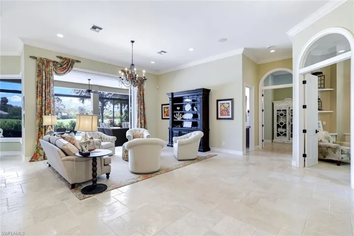 Elevated Ceilings w. Crown Molding + 8' Tall Doors w. Transoms for Light Filled Interior