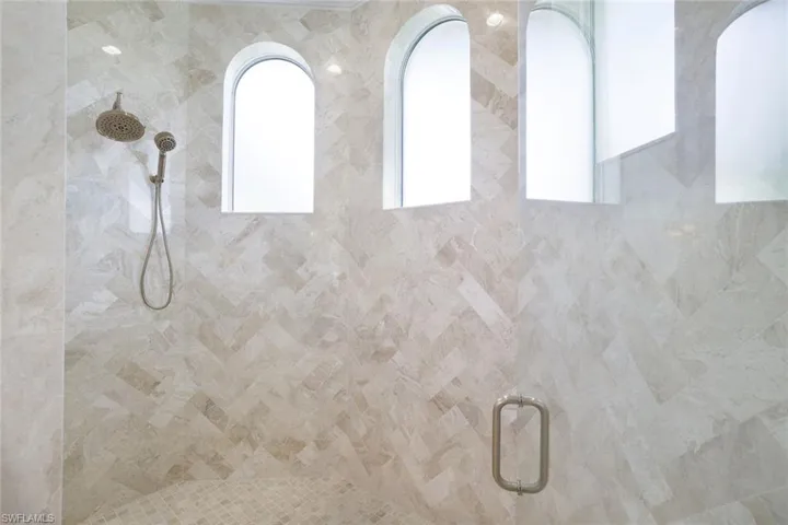Dual Shower Heads & Marble Herringbone Design