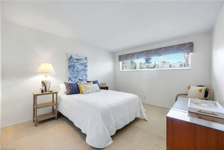 Large guest w/custom closet organizers.