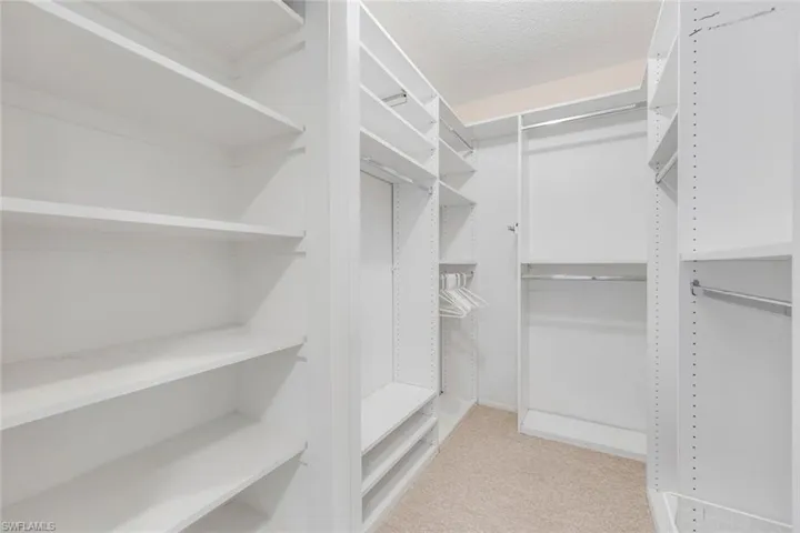 Primary walk-in customized closet