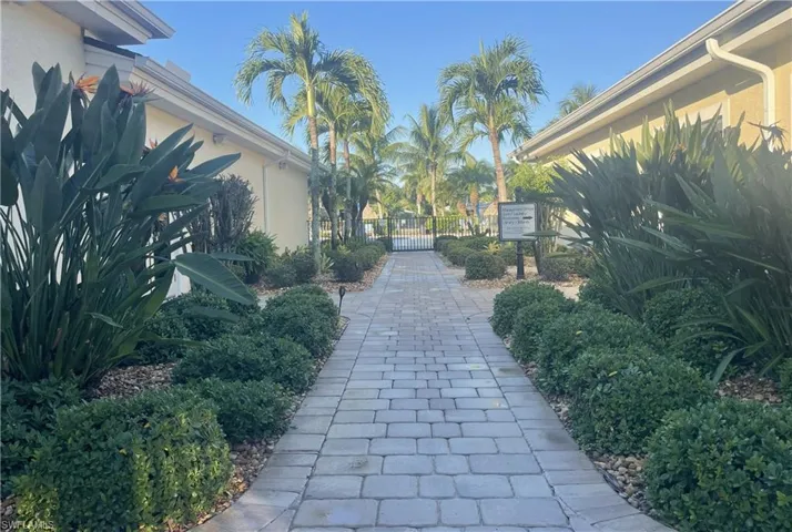 View of home's community featuring a gate