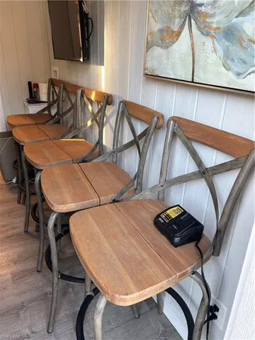 Dining space with wood finished floors