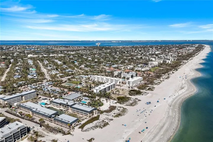 Aerial view with a view of the beach and a water view