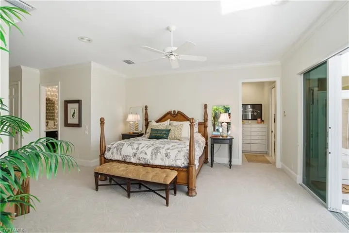 Primary bedroom with his and her private bathrooms and closets. How great is that !