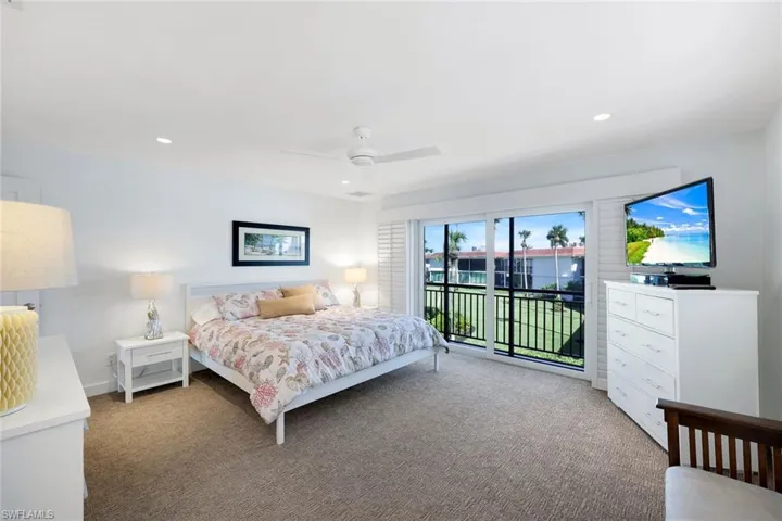Bedroom with carpet, access to outside, a ceiling fan, and recessed lighting