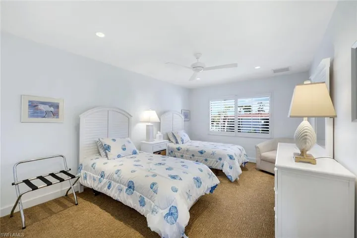 Bedroom featuring carpet, a ceiling fan, and recessed lighting