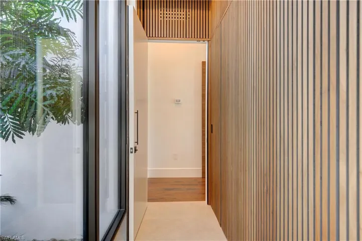 Corridor featuring light hardwood / wood-style flooring