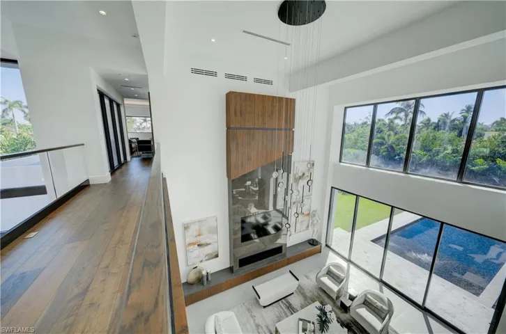 Corridor featuring hardwood / wood-style floors