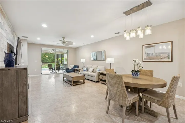 Tiled dining area with ceiling fan