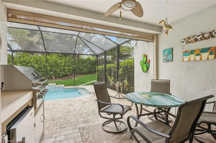 Wonderful lanai space with a beautiful private pool view.