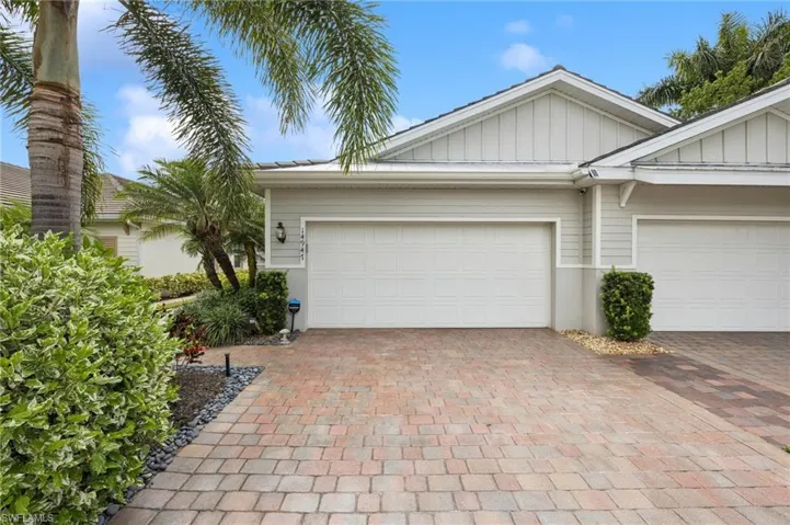 Front facade featuring a two car epoxy garage