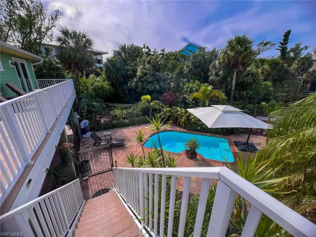 View of swimming pool with a patio
