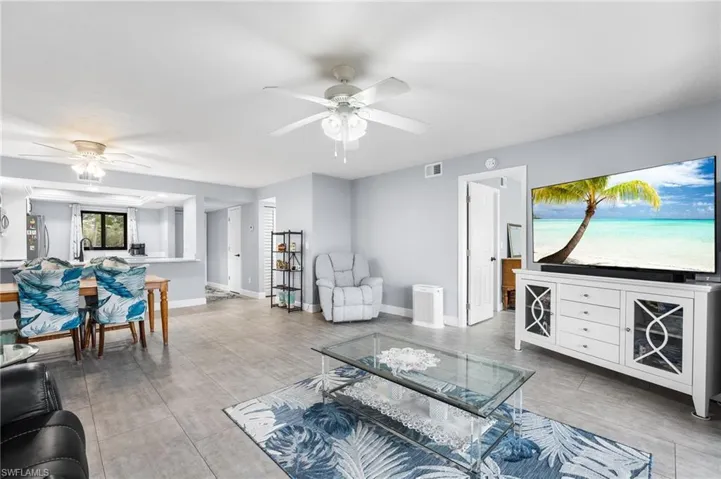 Living room with sink and ceiling fan