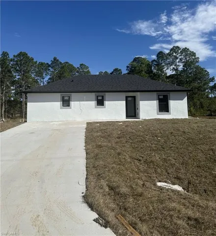 View of front of home featuring a front lawn