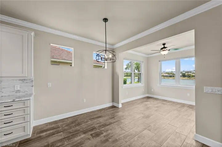 Dining area looking into sunroom
