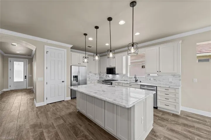 Kitchen w/foyer hall to left