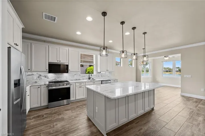 View of kitchen from foyer hall
