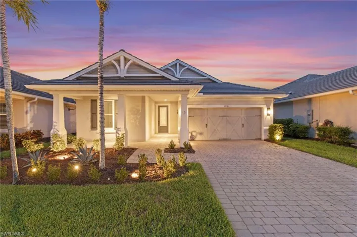 10586 Tidewater Key Blvd at sunset w/NEW low-voltage landscape lighting