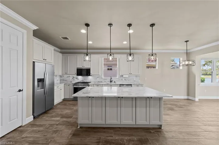 ALL NEW KITCHEN - Cabinets, counter tops, appliances, lights, etc.