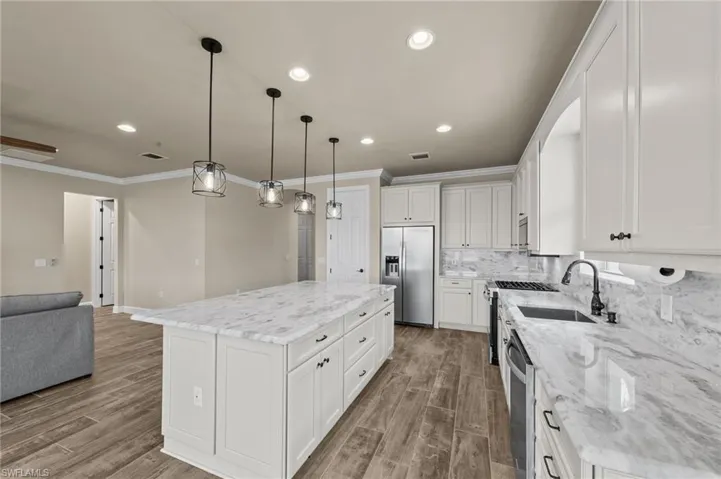 Lots of counter space, and pantry behind the door