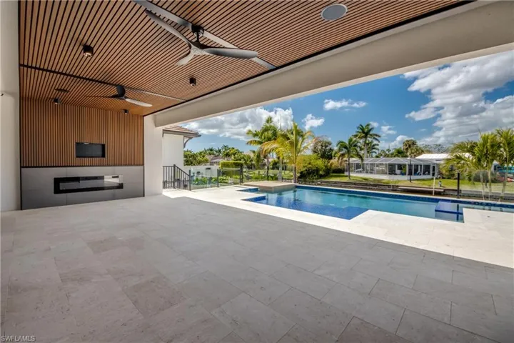 Outdoor pool featuring a patio area