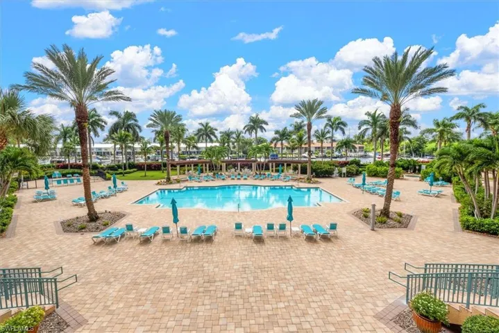 Community pool with a patio area