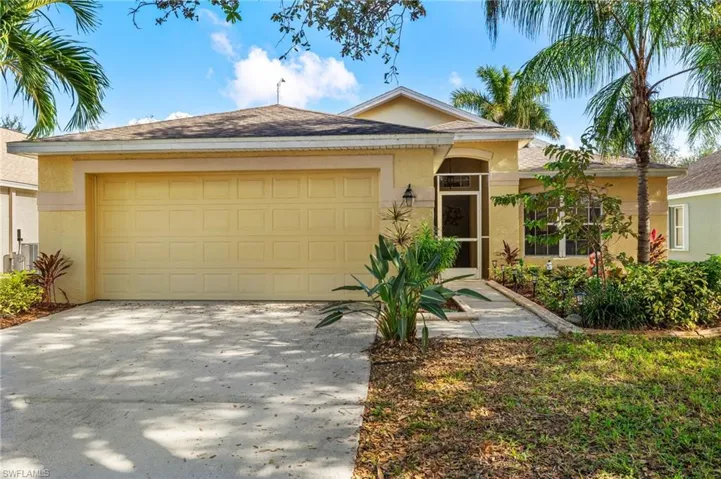 Ranch-style home with a garage
