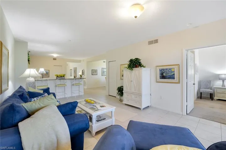 Living area featuring light tile patterned flooring