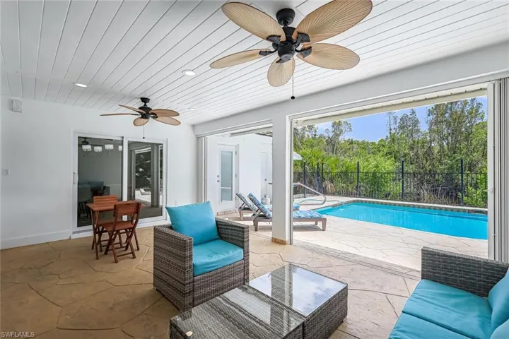 View of patio / terrace with ceiling fan and outdoor lounge area