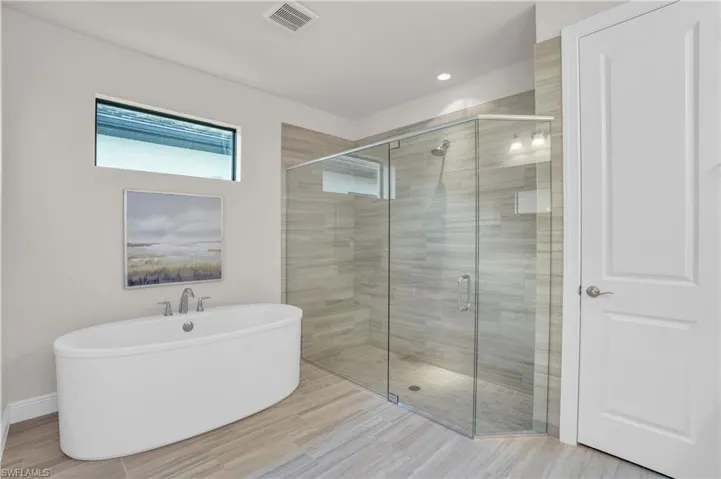 Bathroom with separate shower and tub