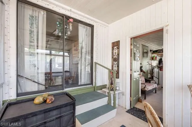 Slider from dining room to sunroom.