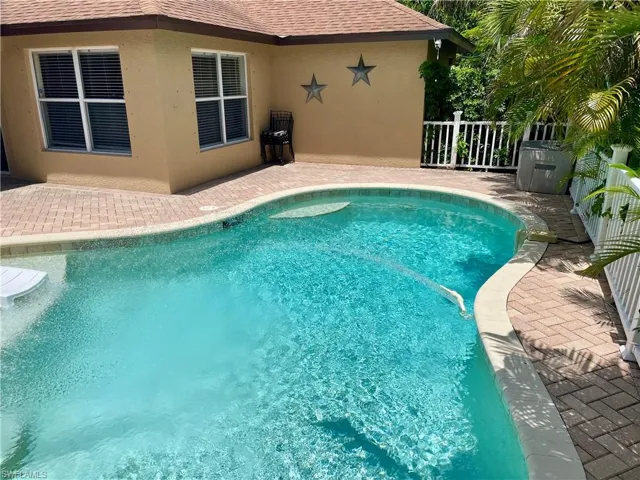 Outdoor pool featuring a patio area