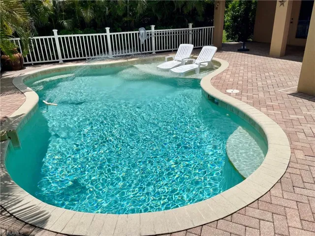 View of swimming pool featuring a patio