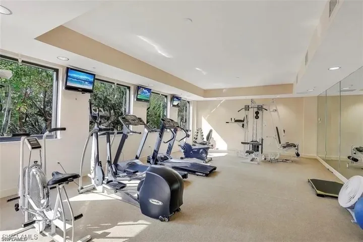 Workout area with a tray ceiling