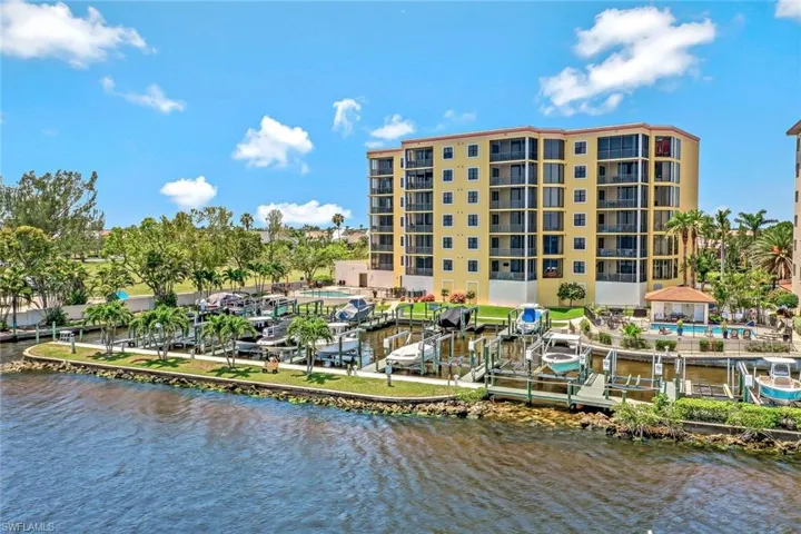 View of building exterior featuring a water view