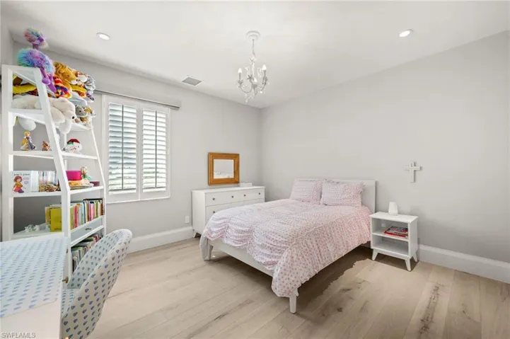 A peaceful secondary bedroom with room to relax, study, or play.