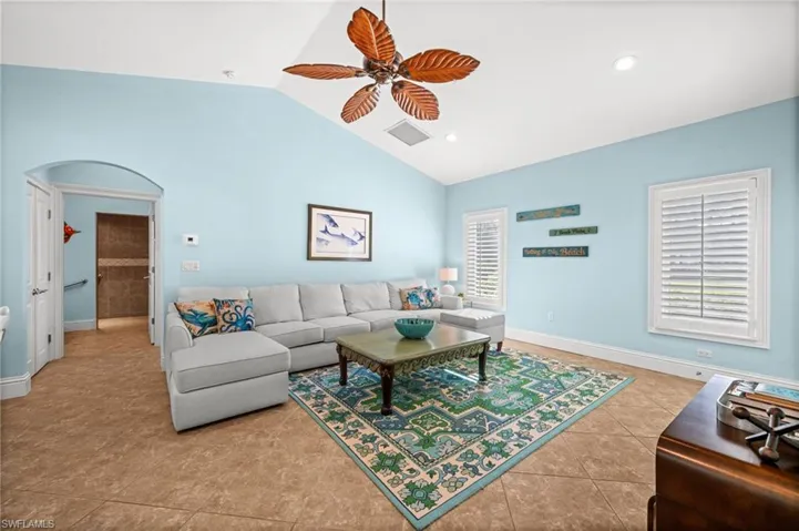 Spacious living room with room to relax, work, entertain, or stay long-term.
