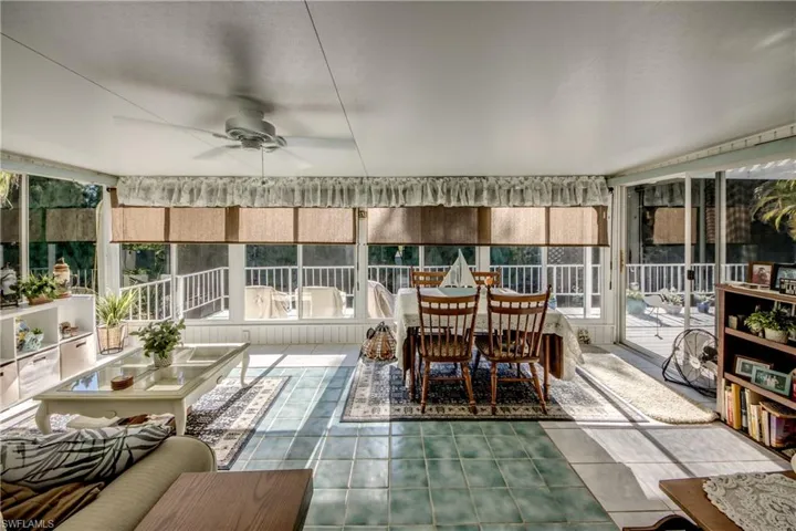 Sunroom with tile patterned floors