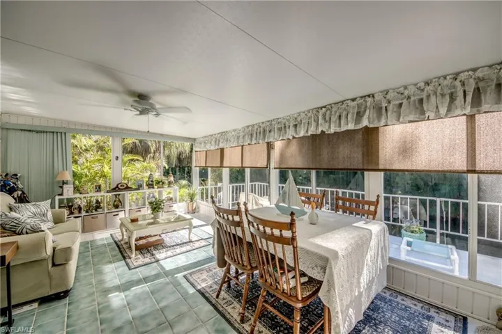 Sunroom / solarium featuring tile patterned floors