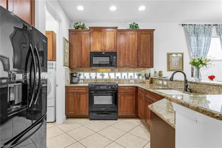 Ample wood cabinetry granite counters