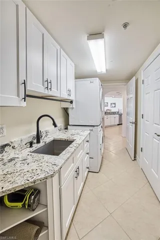 Laundry_with_granite_and_SS_sink