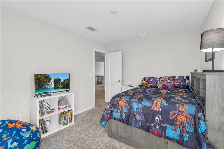 Bedroom featuring carpet floors