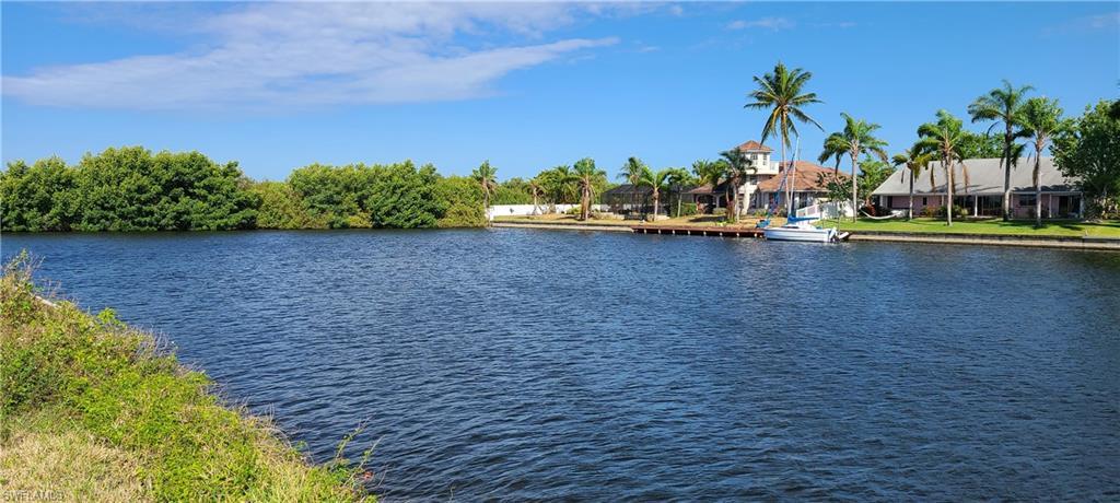 240' wide Gulf access canal with western view to a nature preserve