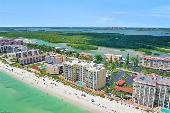 View of urban area with waterfront with a beach