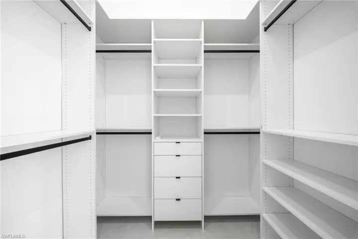 Master custom closet (His)