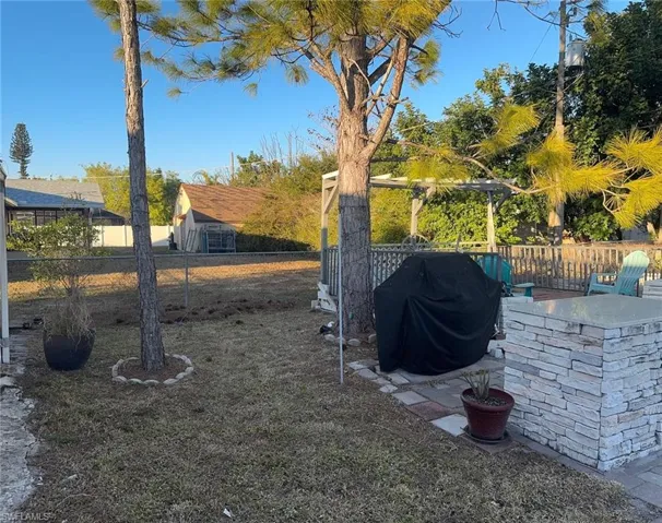 View of fenced backyard