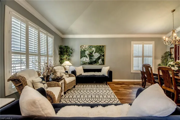 View from Front door looking at Living Room.  Plantation Shutter